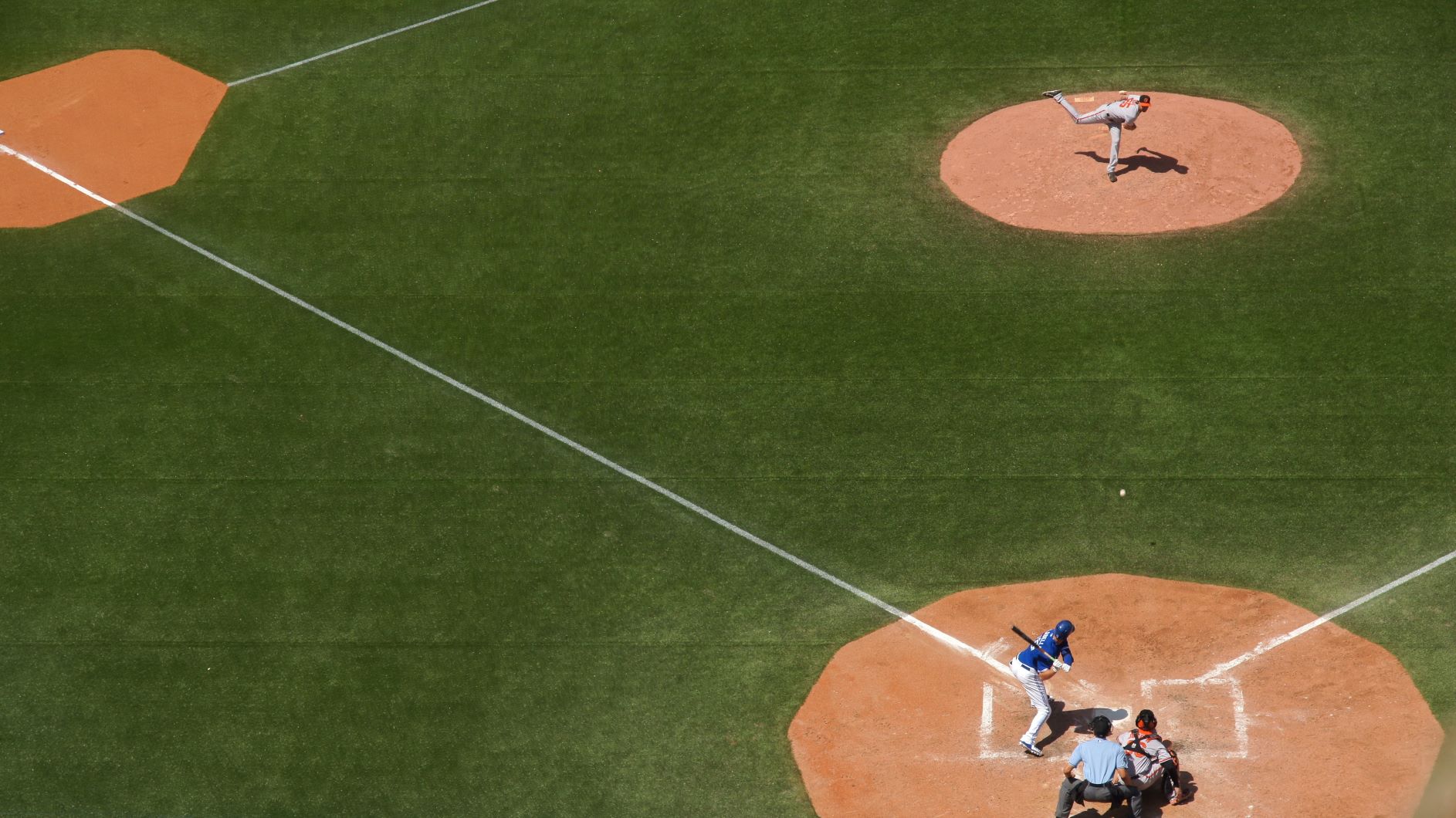 Baseball players playing spring training on a baseball field Baseball players playing spring training on a baseball field