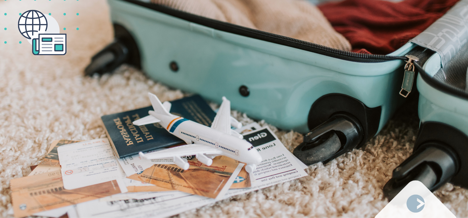 Toy Airplane and Passport with Suitcase for International Relocation