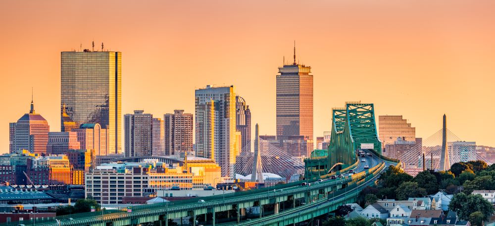 Tobin bridge, Zakim bridge and Boston skyline panorama at sunset.